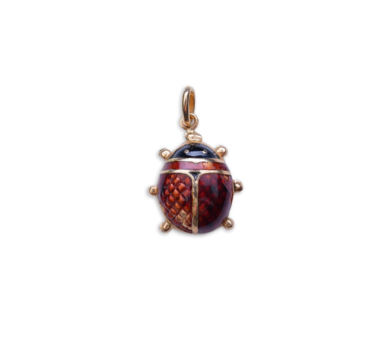 A gold and enamel pendant, Italy, 1960s